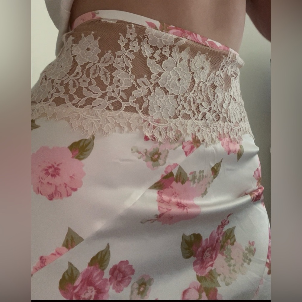 For Love and lemons White and pink floral long skirt with lace trim.